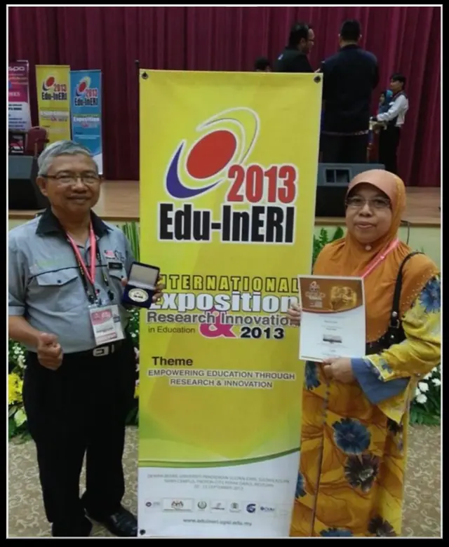 Hj. Itamta dan isteri menerima pingat emas di UPSI 2013